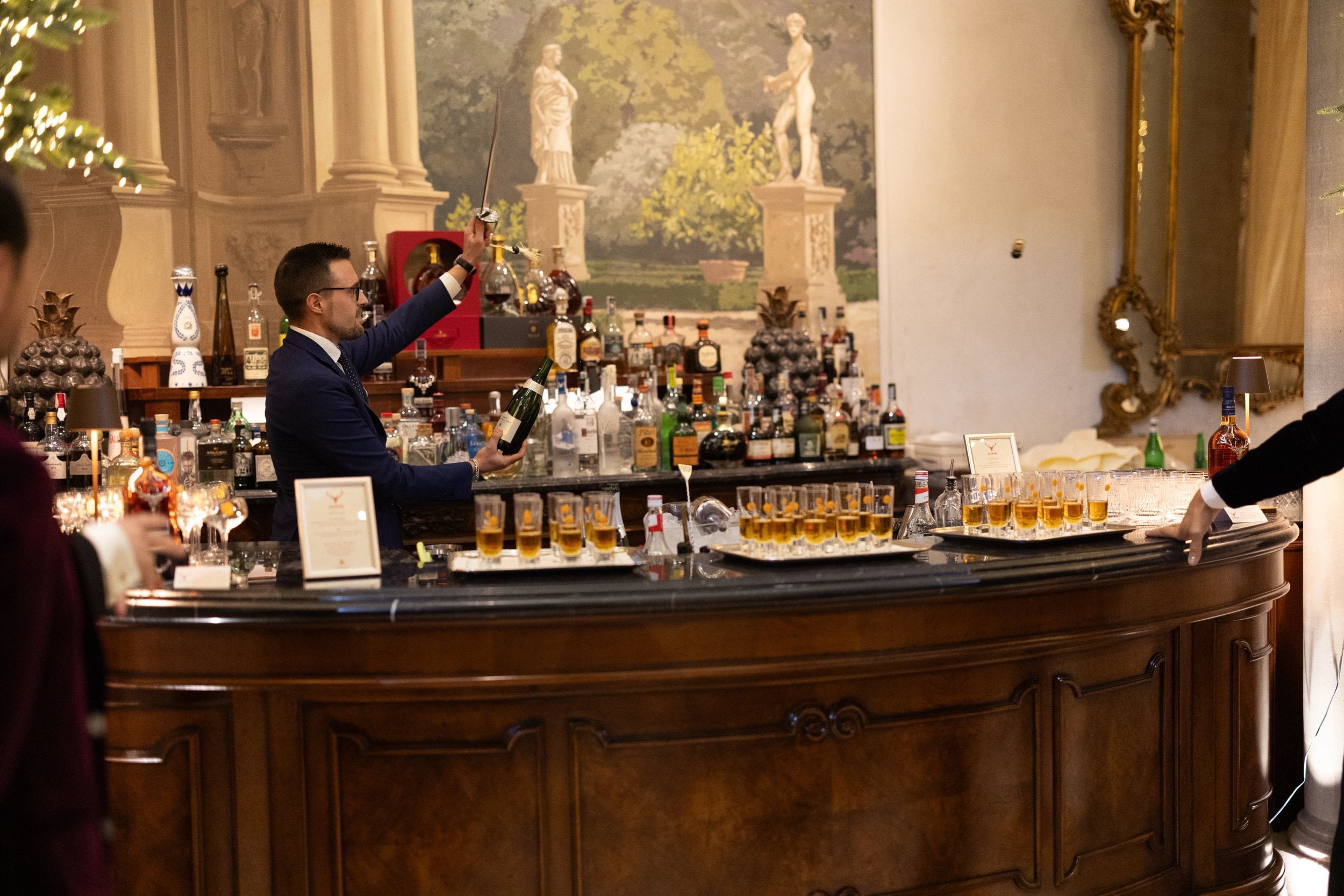 Sabrage ceremony at The St. Regis Florence, a nightly tradition marking special occasions.